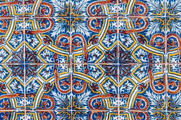 Azulejo is a form of Portuguese or Spanish painted, tin-glazed, ceramic tile work. Azulejos is traditional Portugese tiles in Aveiro. Architecture ornament. Aveiro, Portugal.
