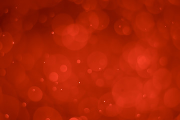 abstract soft bokeh light effect with red background