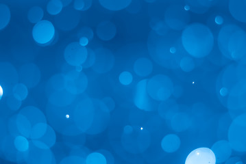 abstract soft bokeh light effect with glow blue background