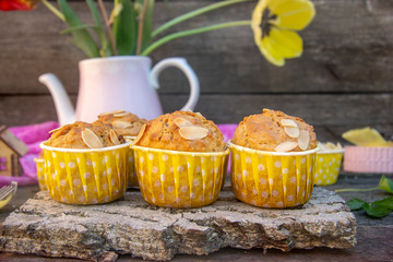 homemade muffins with almond petals