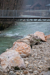 big rocks in front of bridge