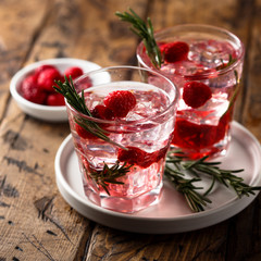 Gin raspberry cocktail with rosemary