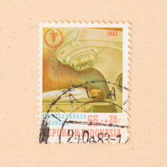 INDONESIA - CIRCA 1983: A stamp printed in Indonesia shows cancer treatment, circa 1983