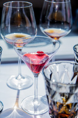Glasses with alcohol and cherry