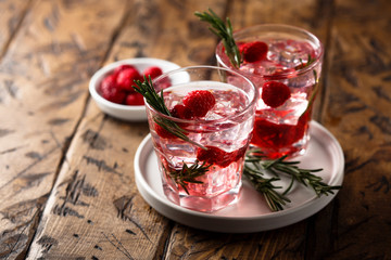 Gin raspberry cocktail with rosemary