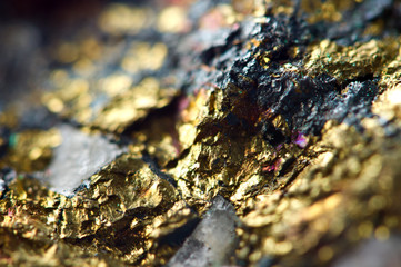 Golden background. Gold nugget. Macro
