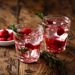 Gin raspberry cocktail with rosemary