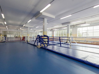 Empty modern fight club with rings for practicing martial arts