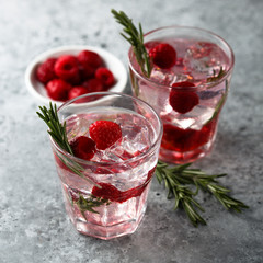 Gin raspberry cocktail with rosemary