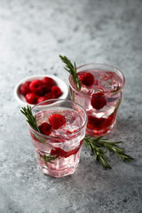 Gin raspberry cocktail with rosemary