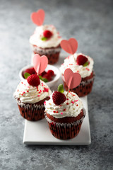 Homemade Red Velvet cupcakes with fresh raspberry