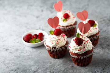 Homemade Red Velvet cupcakes with fresh raspberry