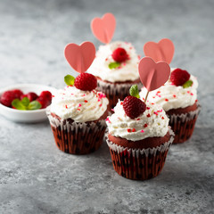 Homemade Red Velvet cupcakes with fresh raspberry