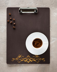 Vintage Clipboard copy space and cup coffee Top view. Flat lay style.