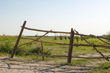 old abandoned wooden fence on the farm