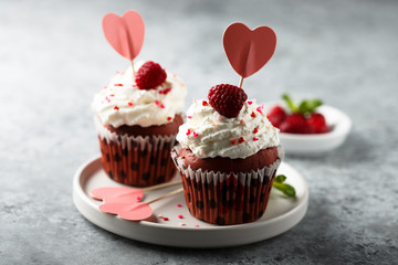 Homemade Red Velvet cupcakes with fresh raspberry