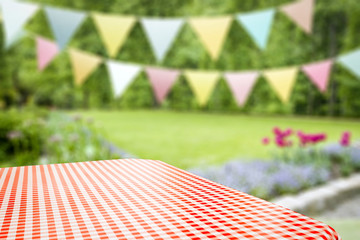 Summer background of tablecloth and garden of summer time 