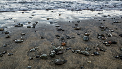 Small stones on the black beach