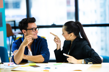 Couples, business people talking in the room. Play game on smart phone in break time