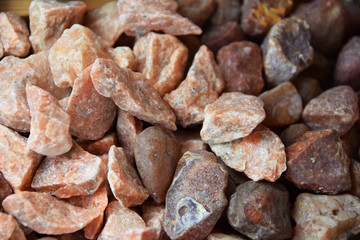 stones of different colors on the stall