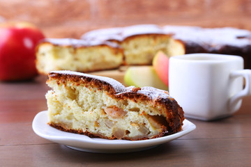 Classic American Homemade apple pie. Piece of tasty Organic Apple Pie and cup with espresso coffee. Dessert Ready to Eat.