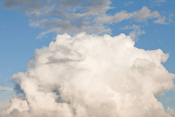 White fluffy clouds in the blue sky