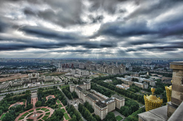 Fototapeta na wymiar Panorama of Ramenki district and cloudy sky at summer in Moscow, Russia, view from MSU, August 2009