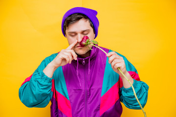 Funny style white man in 90s jacket and hat with peony flower