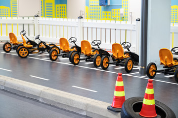 Playground for pedal race cars in activity park.