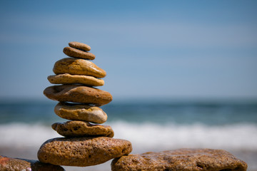 cairn on sea background. pyramid