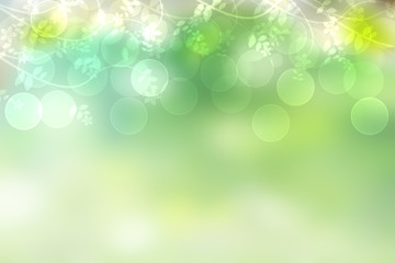 Fototapeta premium Abstract gradient green light and yellow colorful pastel spring or summer bokeh background with leaves and circular lights. Beautiful texture.