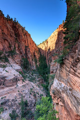 Fototapeta na wymiar Angels Landing is a rock formation in Zion National Park in southwestern Utah in the United States.It’s steep and very narrow trail for advanced hikers. View of Angels Landing trails