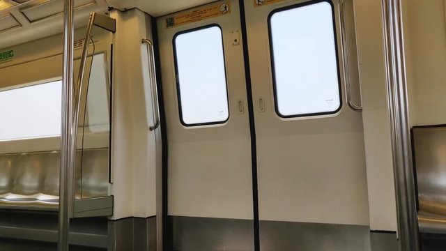 Inside of Delhi Metro while the train is moving.