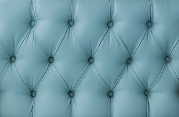texture of sofa upholstery, armchairs. Leather sofa, leather chair. retro furniture surface. cyan; blue; turquoise