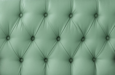 texture of sofa upholstery, armchairs. Leather sofa, leather chair. retro furniture surface. cyan; green, turquoise