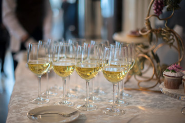 Glasses with champagne on a buffet table for snacks
