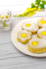 Easter biscuits like eggs with citrus cream