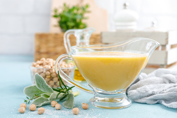 Chickpea sauce, hummus with ingredients for cooking