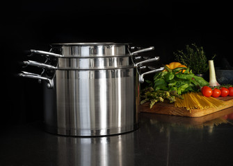 Cooking utensils in kitchen, Pots for delicious food.
