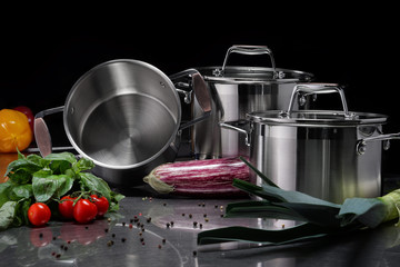 Cooking utensils in kitchen, Pots for delicious food.