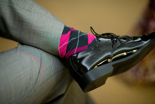 Formal man with fun colorful socks