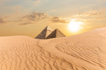 The Pyramid of Khafre and the Pyramid of Menkaure, view from sand-dunes, Egypt