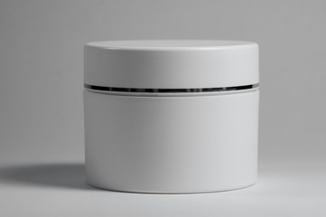 white cosmetic jar