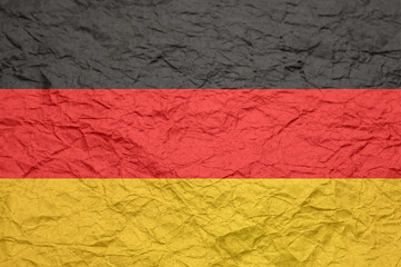 Germany flag on old crumpled craft paper.