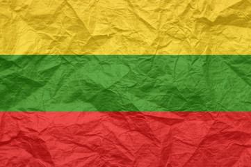 Lithuania flag on old crumpled craft paper.