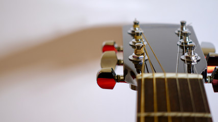 guitar headstock with tuning pegs . color background