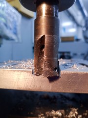 Milling machine, metal machining, aluminum and steel.