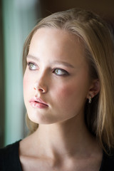 Fototapeta premium Close up portrait of beautiful young blonde woman
