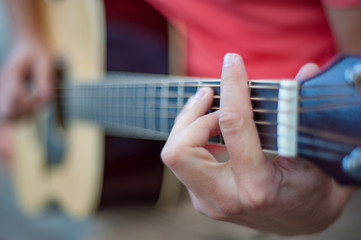 Man playing guitar , close up