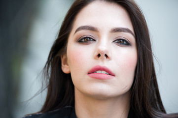Obraz premium Close up portrait of beautiful young brunette woman 